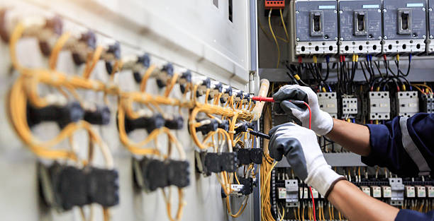 Professional Electrician technician working in Red Lick, TX
